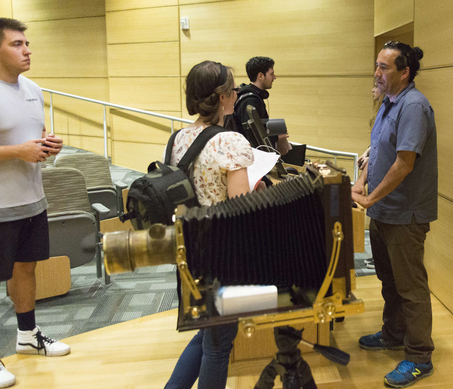 Will Wilson speaks with students after his lecture on tintype. Photo by Julie Ostler