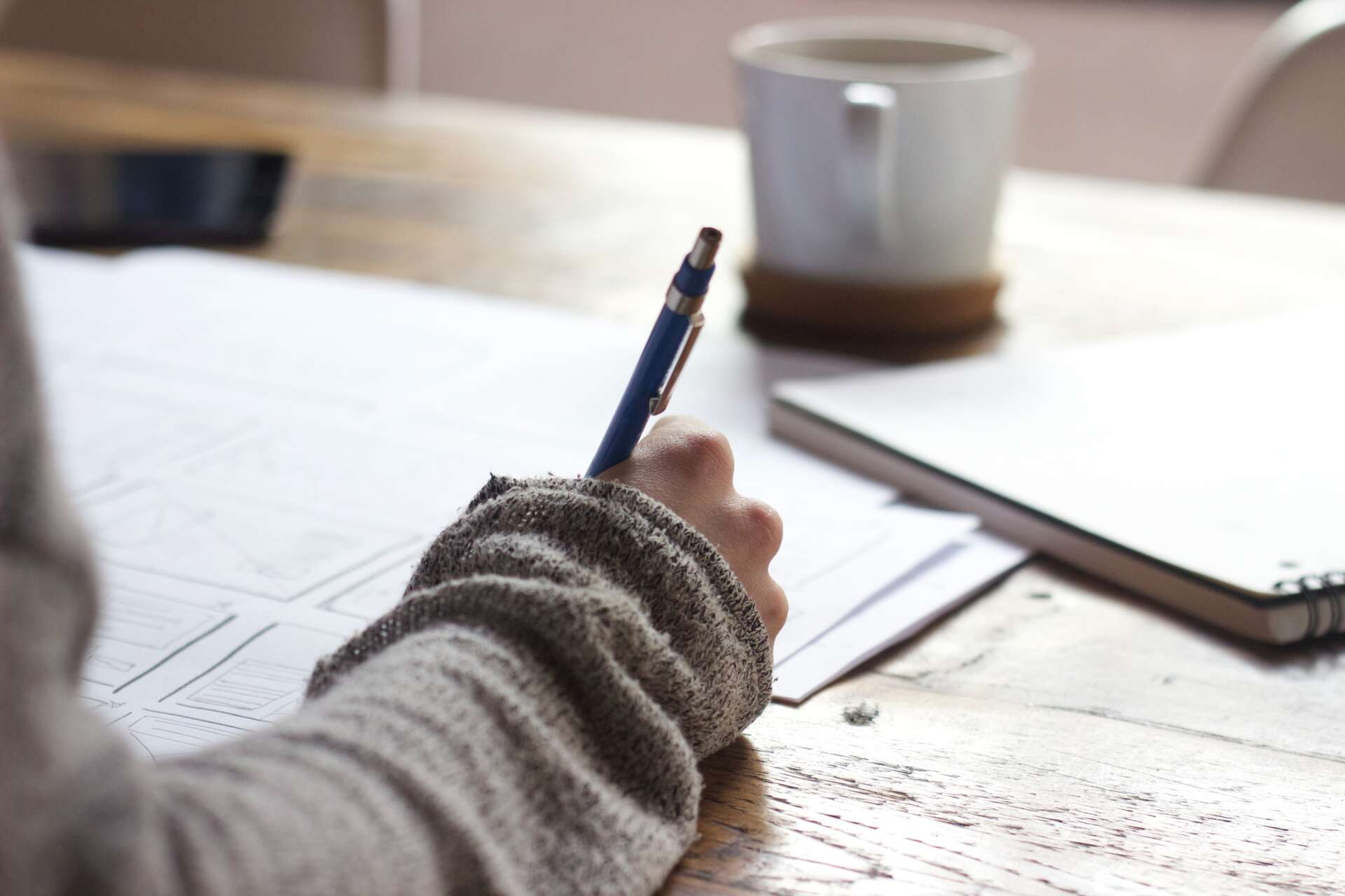 An indiscernible person prepares for an exam.