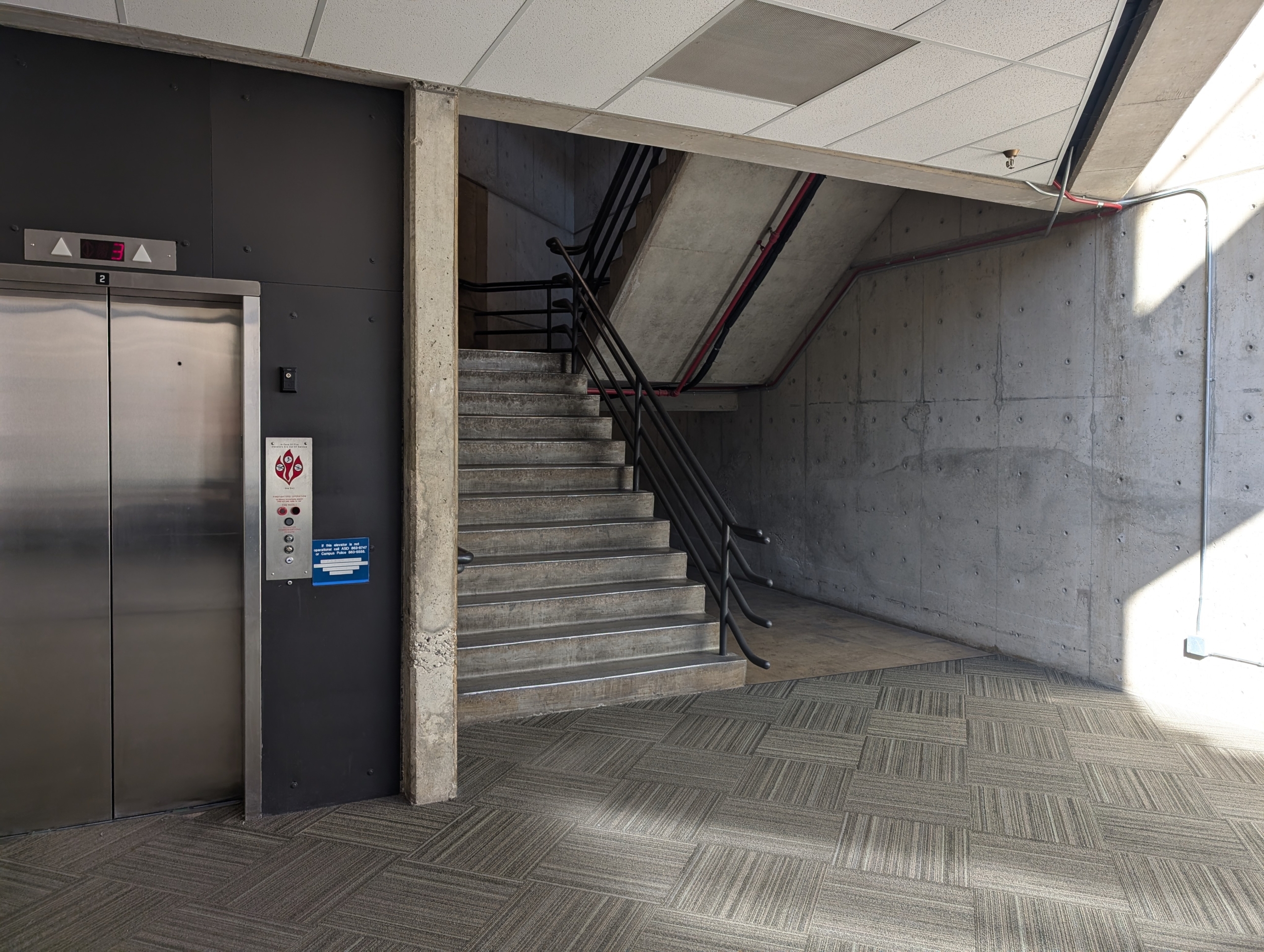 Second Floor view of the main staircase in the Sparks Automotive Building